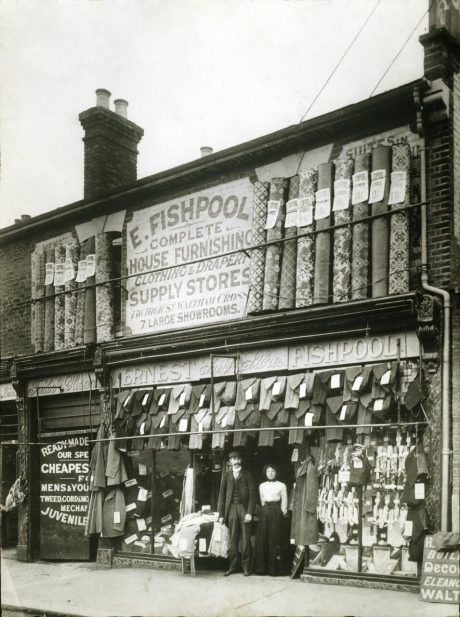 Man and women outside Fishpools furniture store in 1899