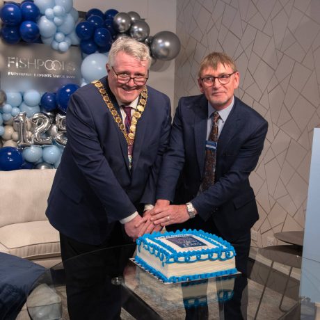 The Mayor of the Borough of Broxbourne cutting a cake