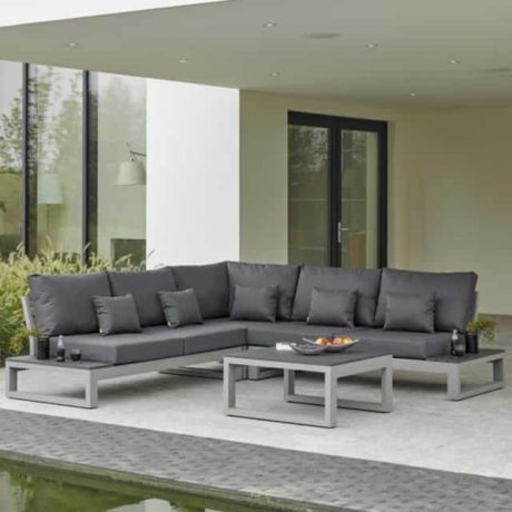Dark grey outdoor couch with a table