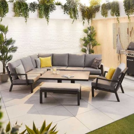 Grey outdoor couch with a table