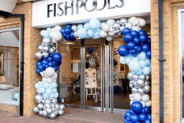 Fishpools furniture store exterior entrance with balloons around doorway