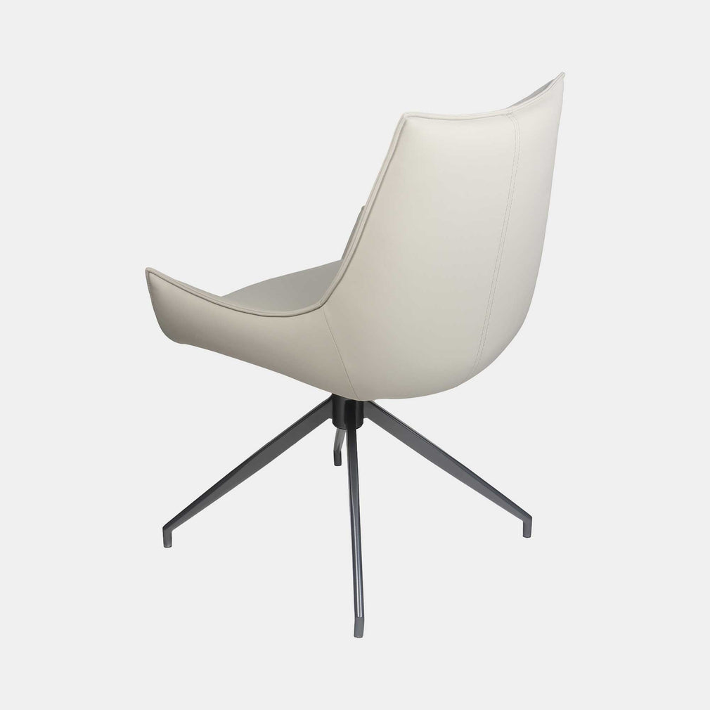 Torres - Swivel Dining Chair In PU Beige