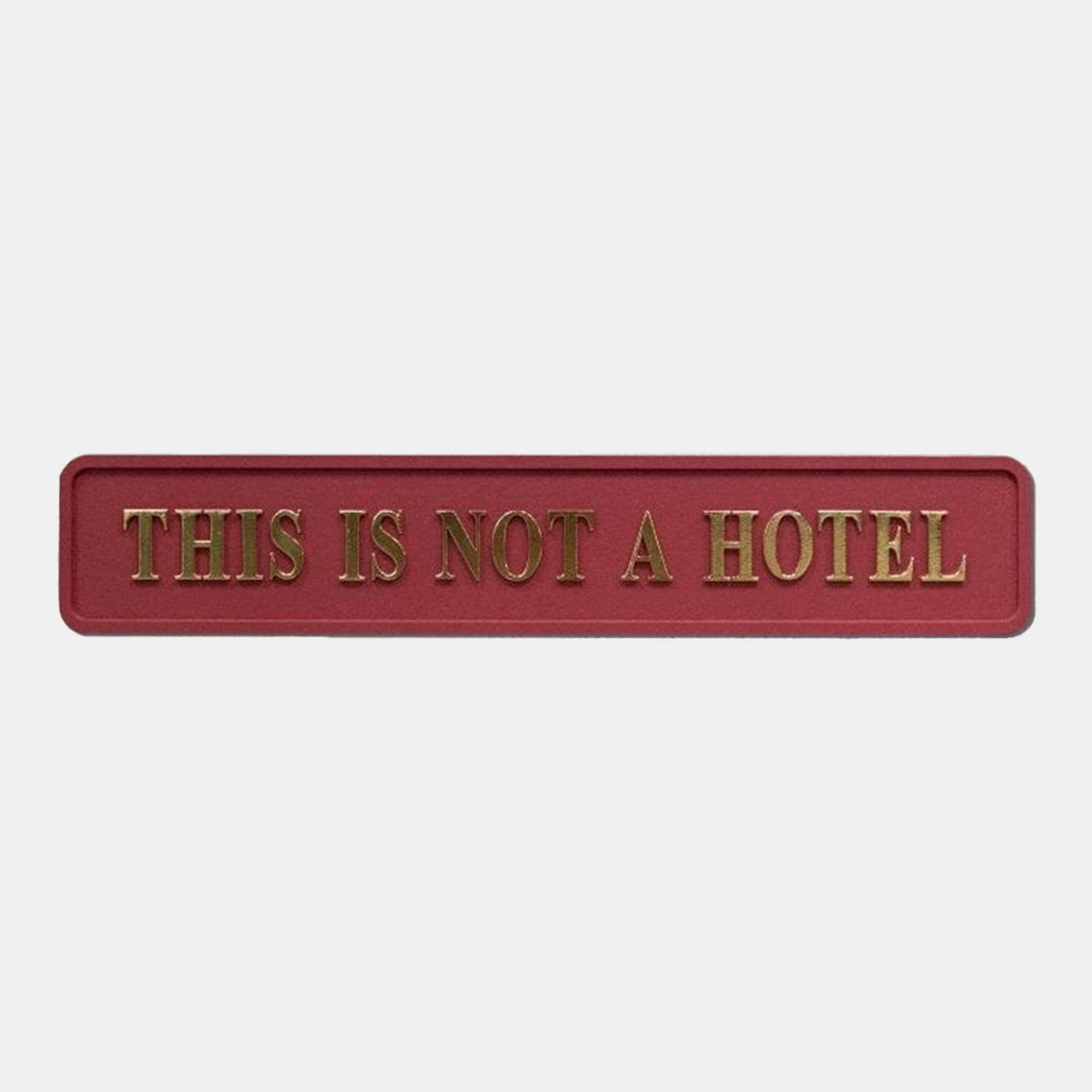 This Is Not A Hotel - Gold Foiled Sign