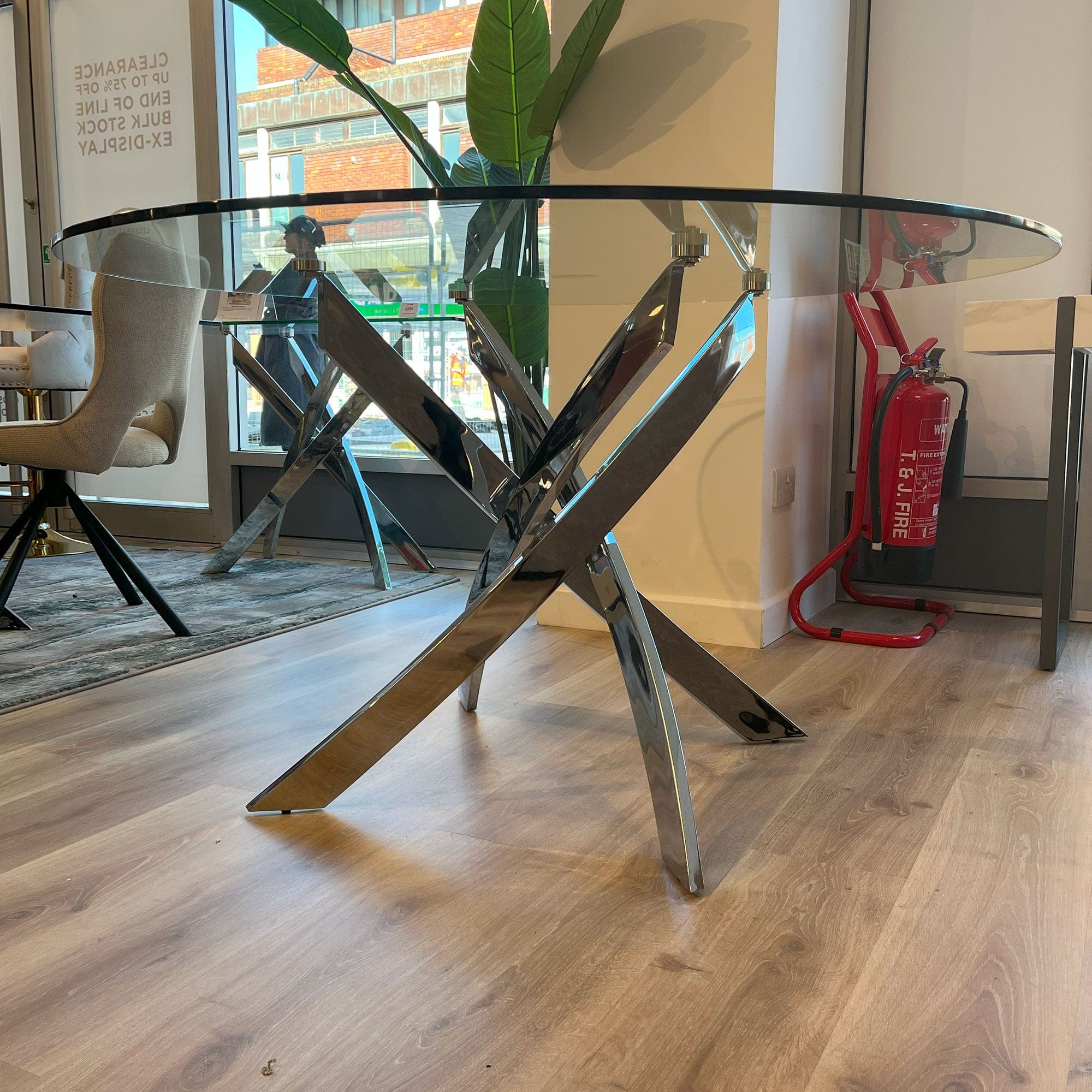 Puzzle 130cm Round Dining Table Chrome/Glass Top