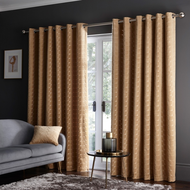 Lucca Ochre Pair of Lined Eyelet Curtains